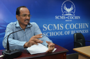 Mr. C.V George, Former General Manager, RBI, delivers an engaging talk on the Indian Economy at SCMS Cochin School of Business