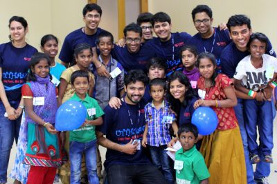 Symbiosis Students having fun with Kids