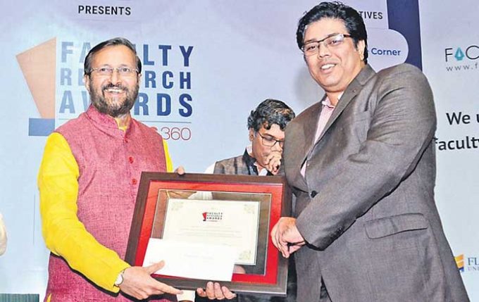Dr. Purkayastha Of ICFAI Business School Awarded By Union HRD Minister Prakash Javadekar